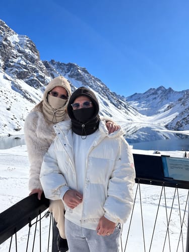Customers wearing winter hoods in mountains